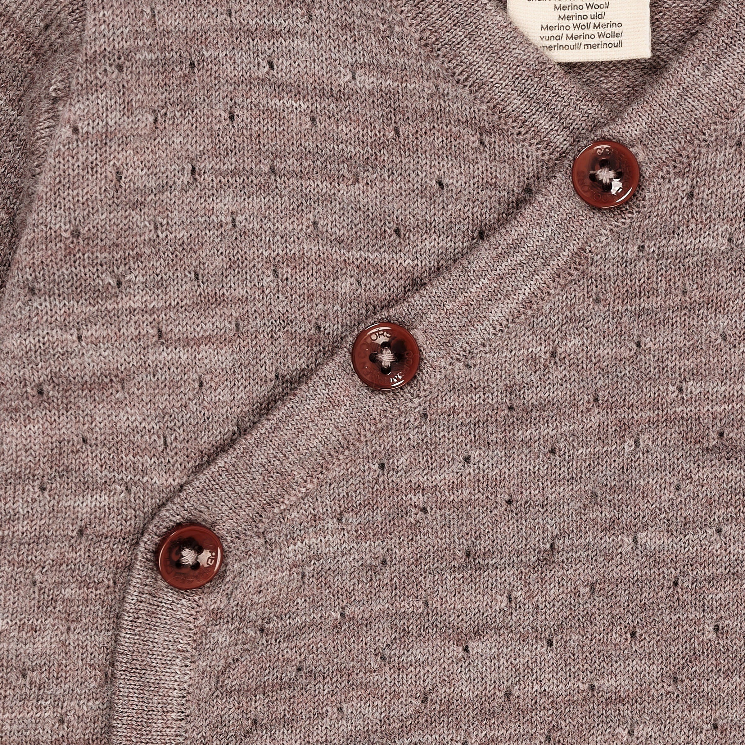 Merino crossover cardigan with hole pattern