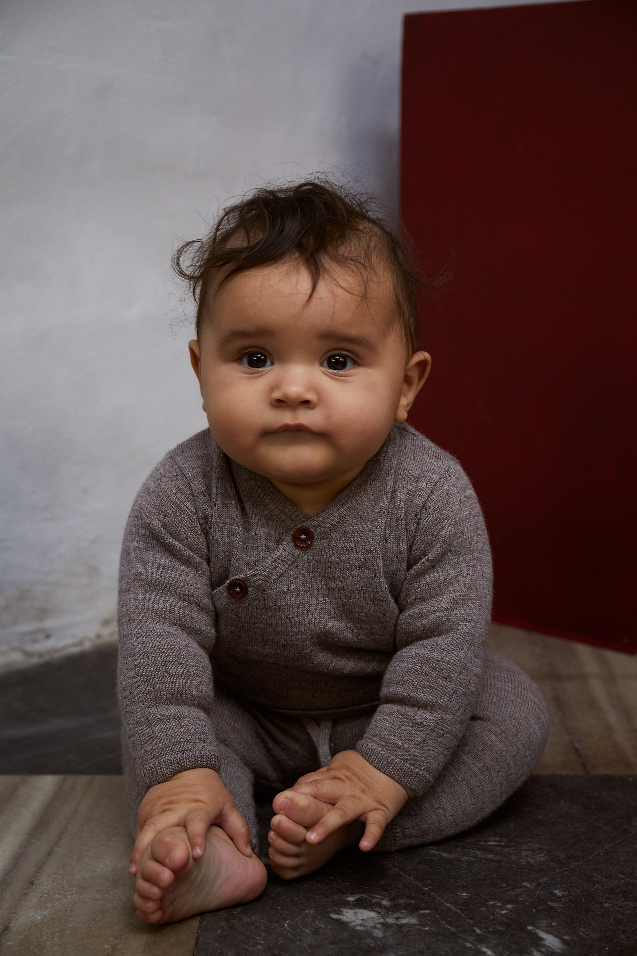 Merino crossover cardigan with hole pattern