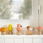 Janod WWF wooden screw toys birds and mushrooms styled in a windowsill