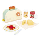 Janod's wooden bread toaster toy for role play on a white background