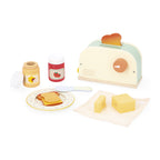 Janod's wooden bread toaster toy for role play on a white background