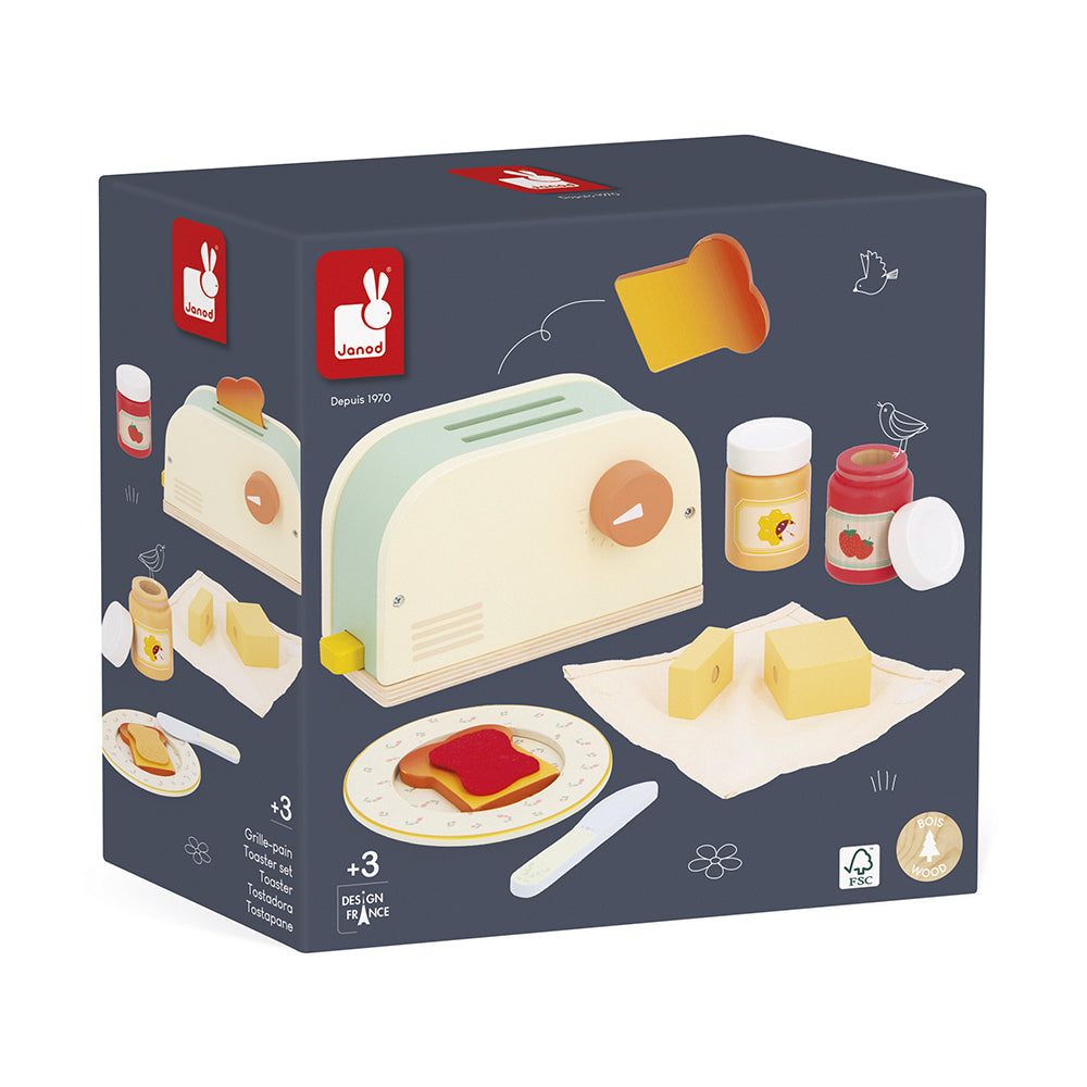 Original packaging of Janod's wooden bread toaster toy on a white background