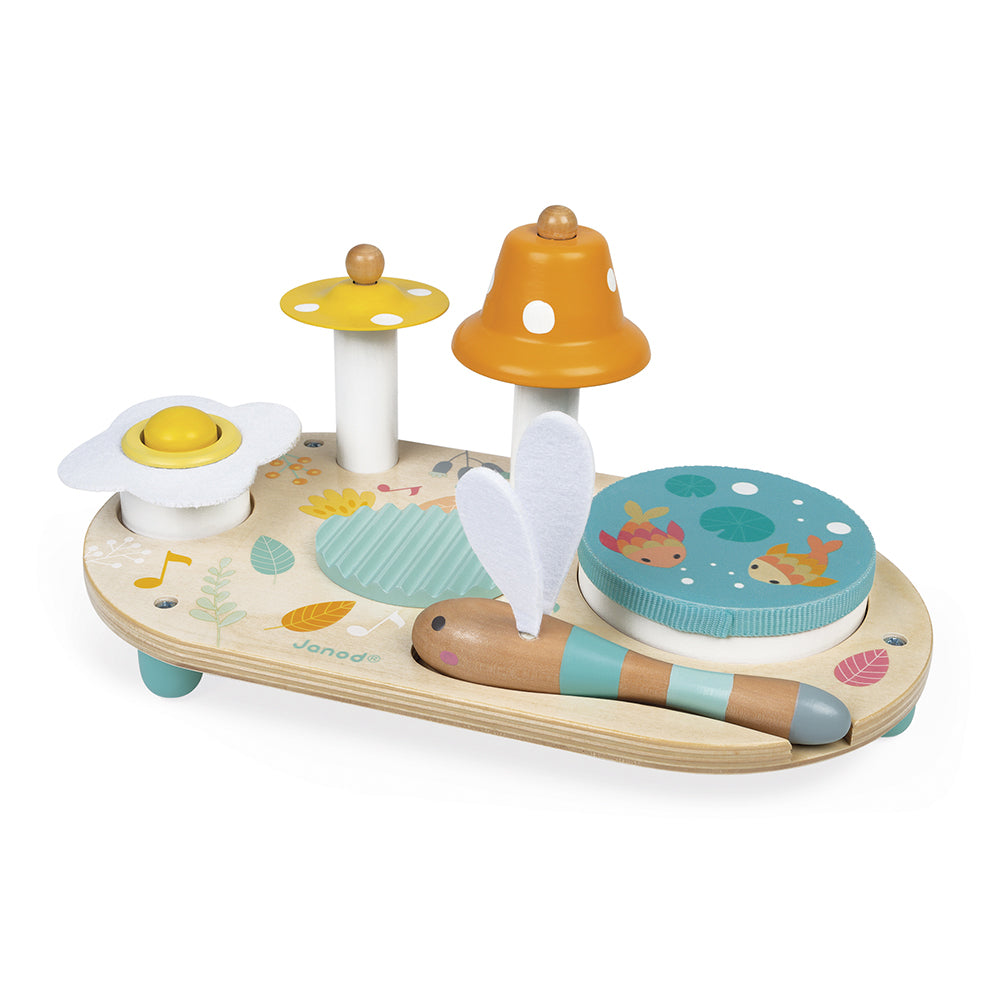 Wooden musical activity table by Janod for sensory play on a white background