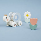 Janod Pull along snail on a blue background