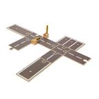 Kids Concept car track extension set with an open barrier on a white background