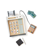 Top view of a Kid's Concept toy cash register on a white background