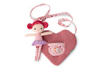 Lilliputiens Aline doll with heart bag on a white background