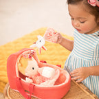 Child playing with a Lilliputiens Baby playset Lena
