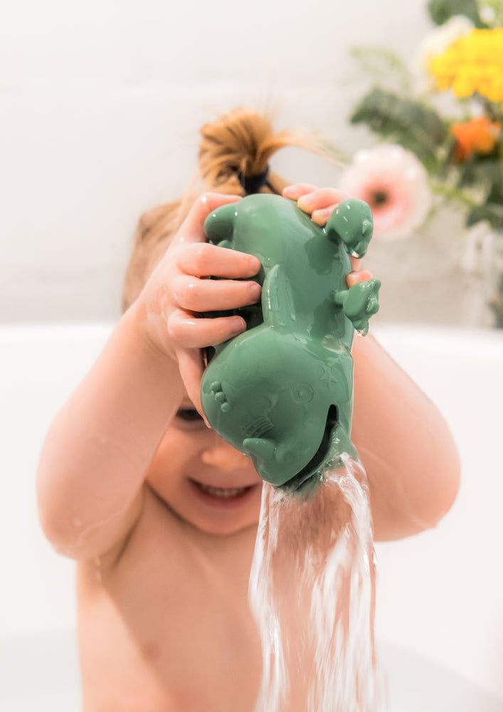 Child playing with a Joe the floating dragon
