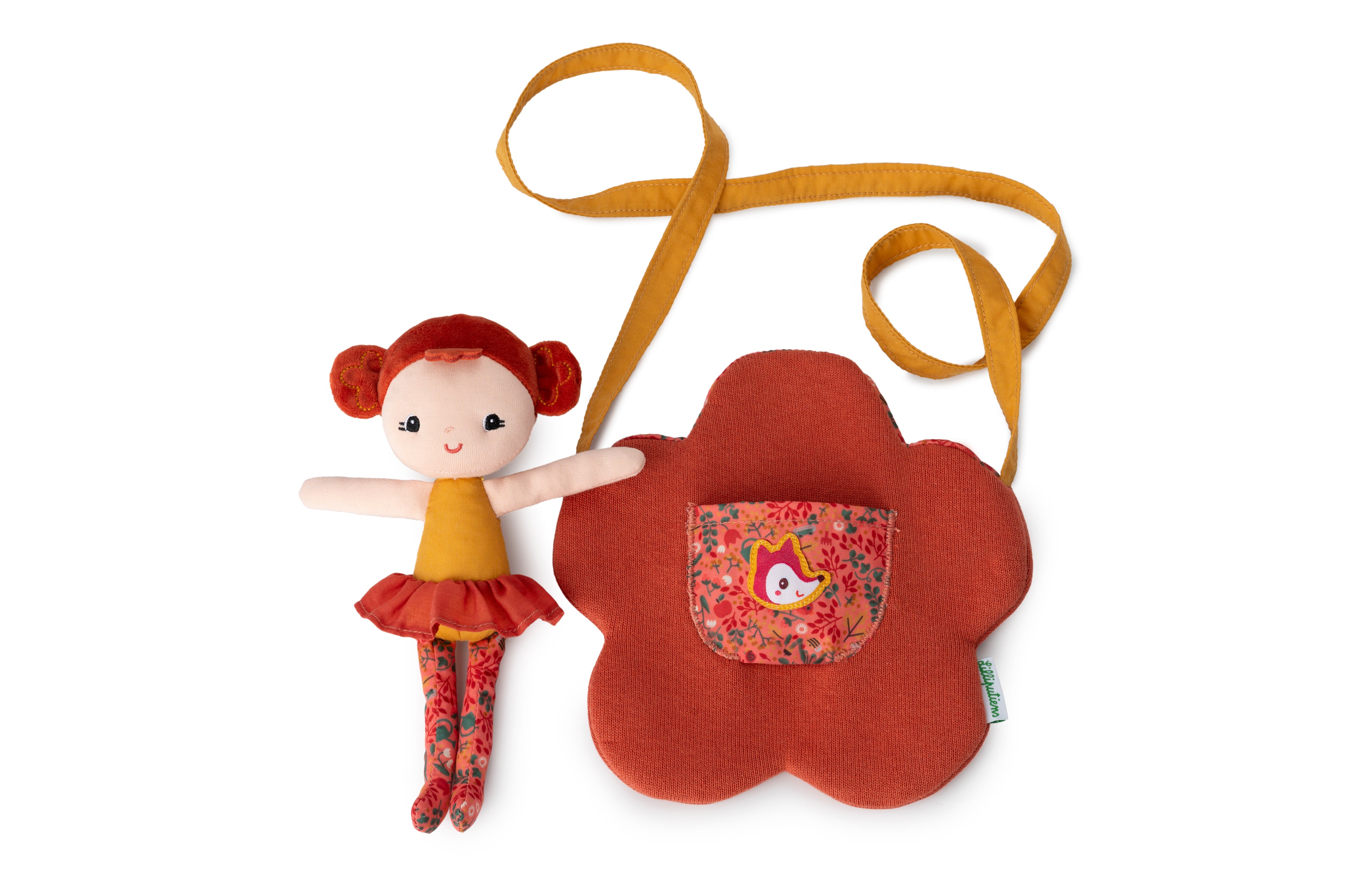 Lilliputiens Adèle doll with flower bag on a white background