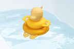 Lilliputiens bath pyramid Gaspard floating on water