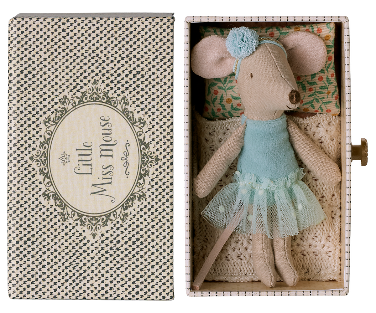 Maileg Dance Mouse Little Sister lying on a matchbox bed wearing a blue outfit