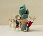 Maileg King Mouse Dad styled next to a stack of doll plush chairs and another Maileg mouse (not included)