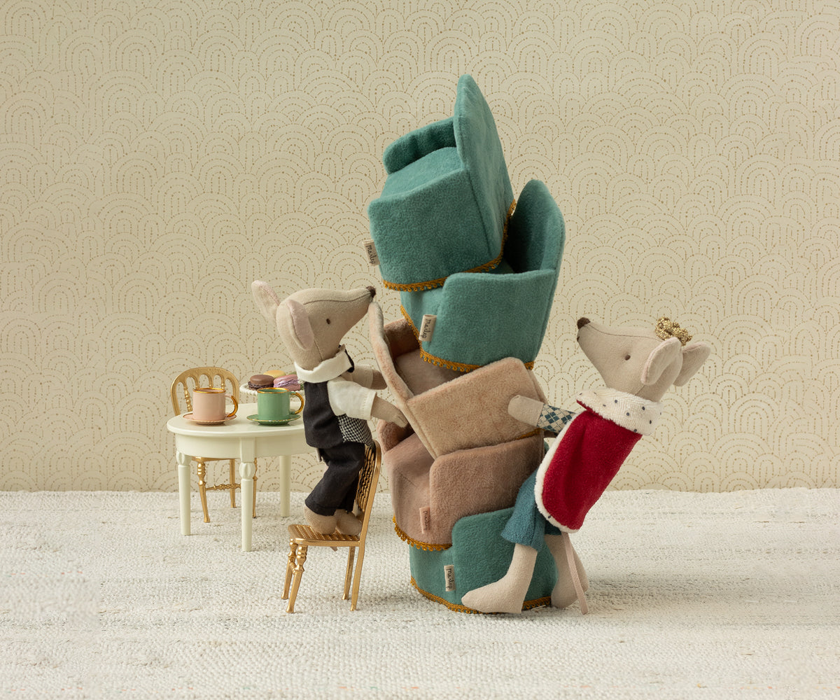 Maileg King Mouse Dad styled next to a stack of doll plush chairs and another Maileg mouse (not included)