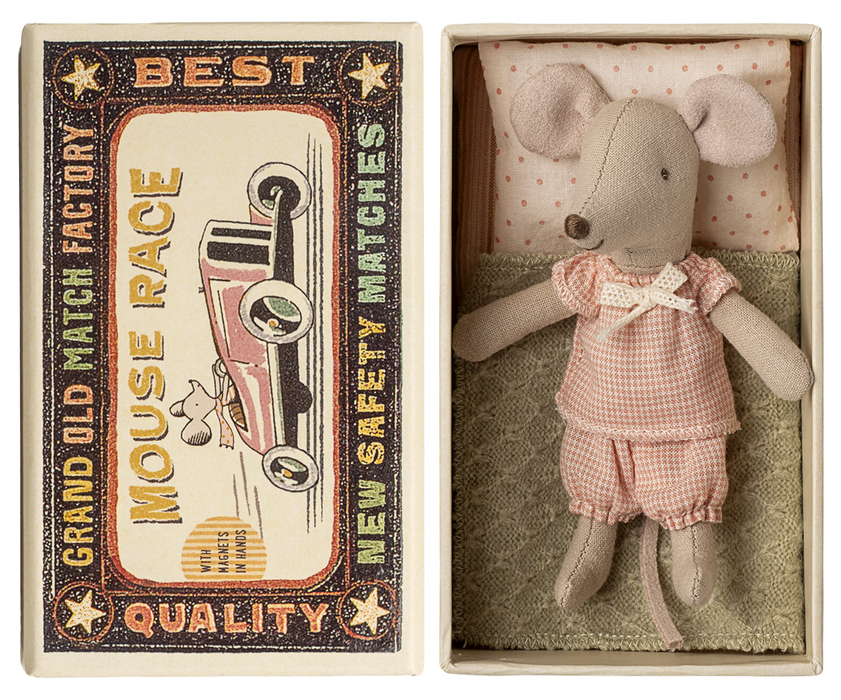 Maileg Little Sister Mouse wearing a pink checkered outfit in matchbox bed