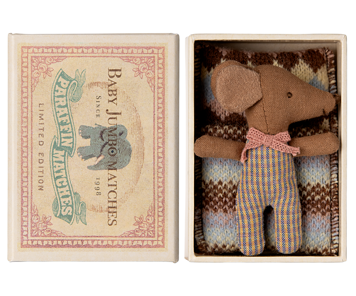 Maileg Sleepy Wakey Baby Mouse in matchbox sleeping in rose-checked outfit with head turned to right