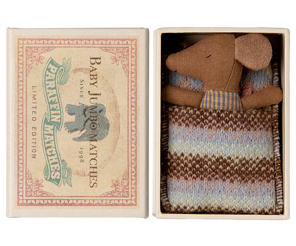 Maileg Sleepy Wakey Baby Mouse in matchbox sleeping in rose-checked outfit with head turned to left