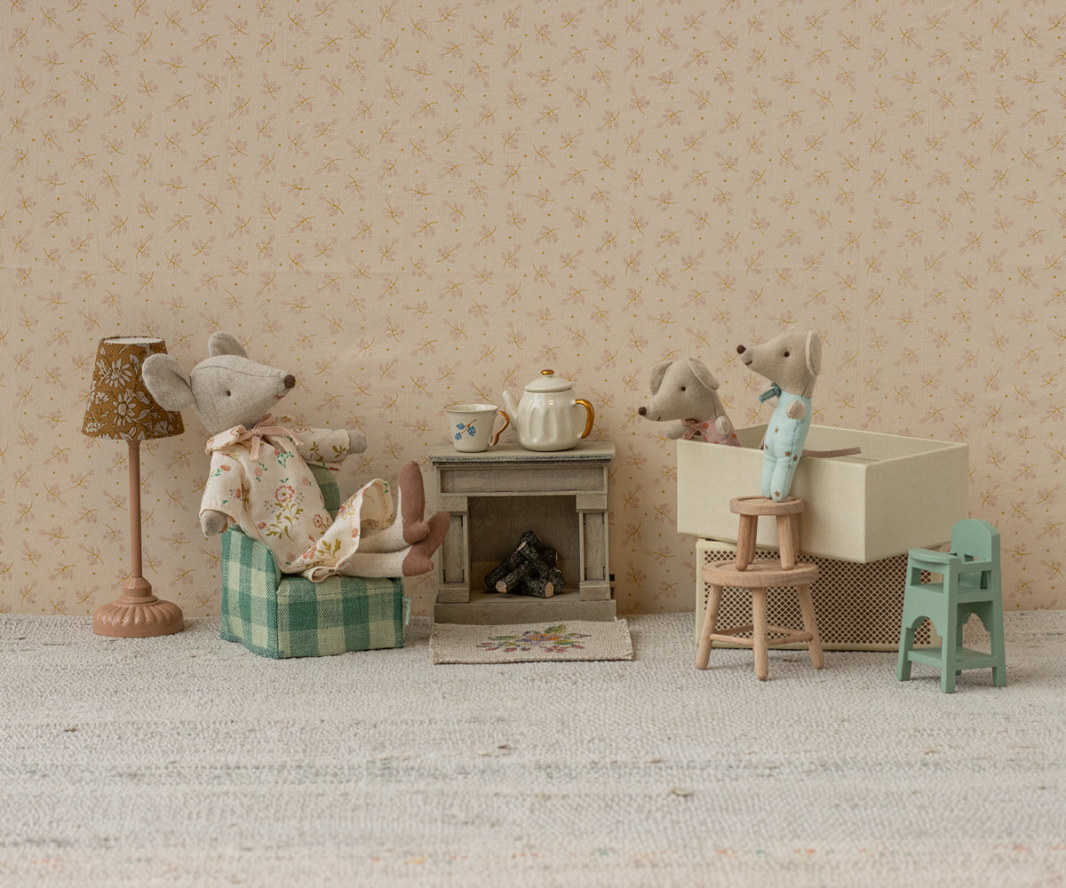 Maileg Baby Mouse Twins styled in a doll living room with miniature furniture