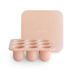 Mushie fresh food feeder tray in Blush on a white background