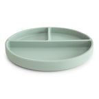 Side view of Mushie silicone suction divided plate in Cambridge blue on a white background