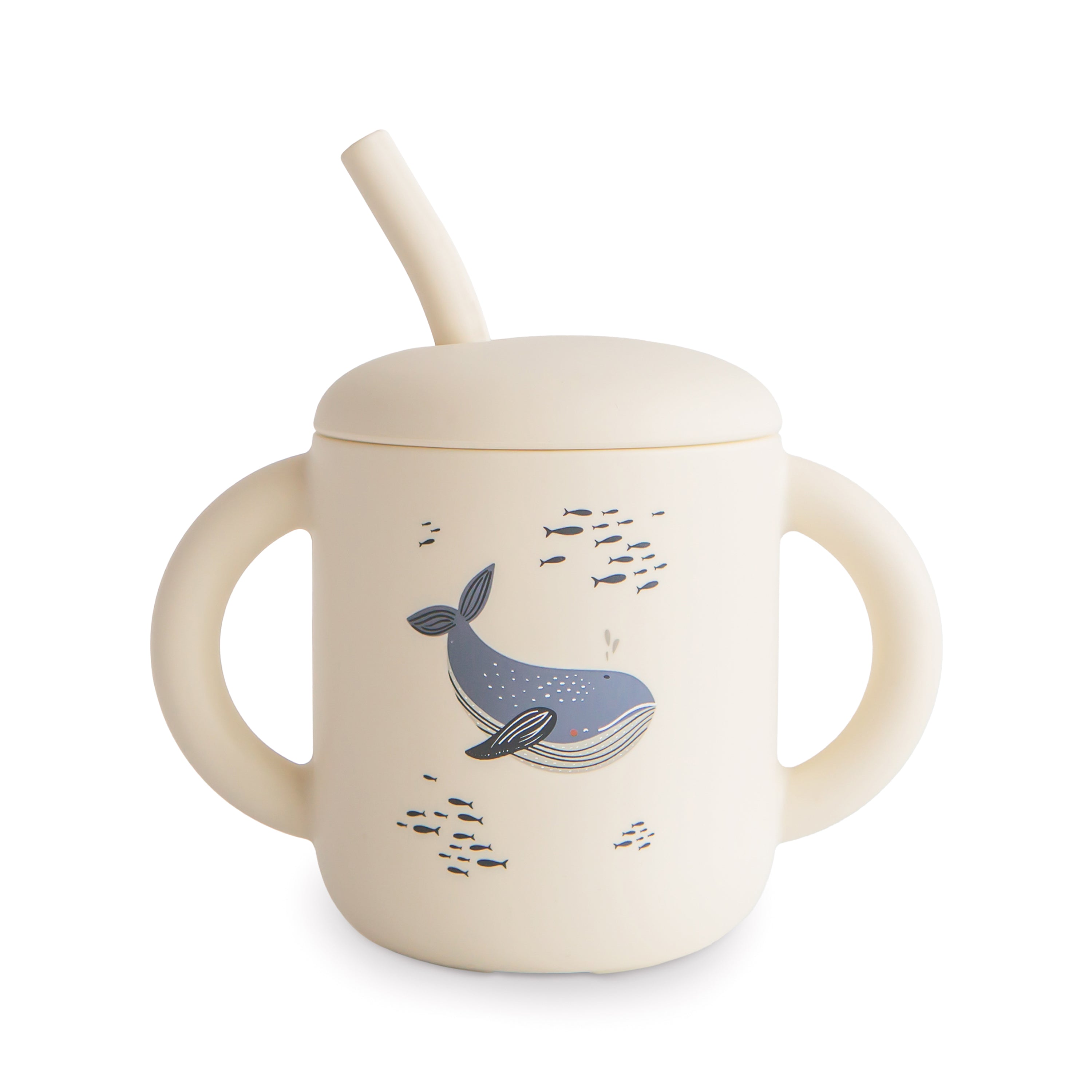 Mushie training cup with straw in Whales print on a white background