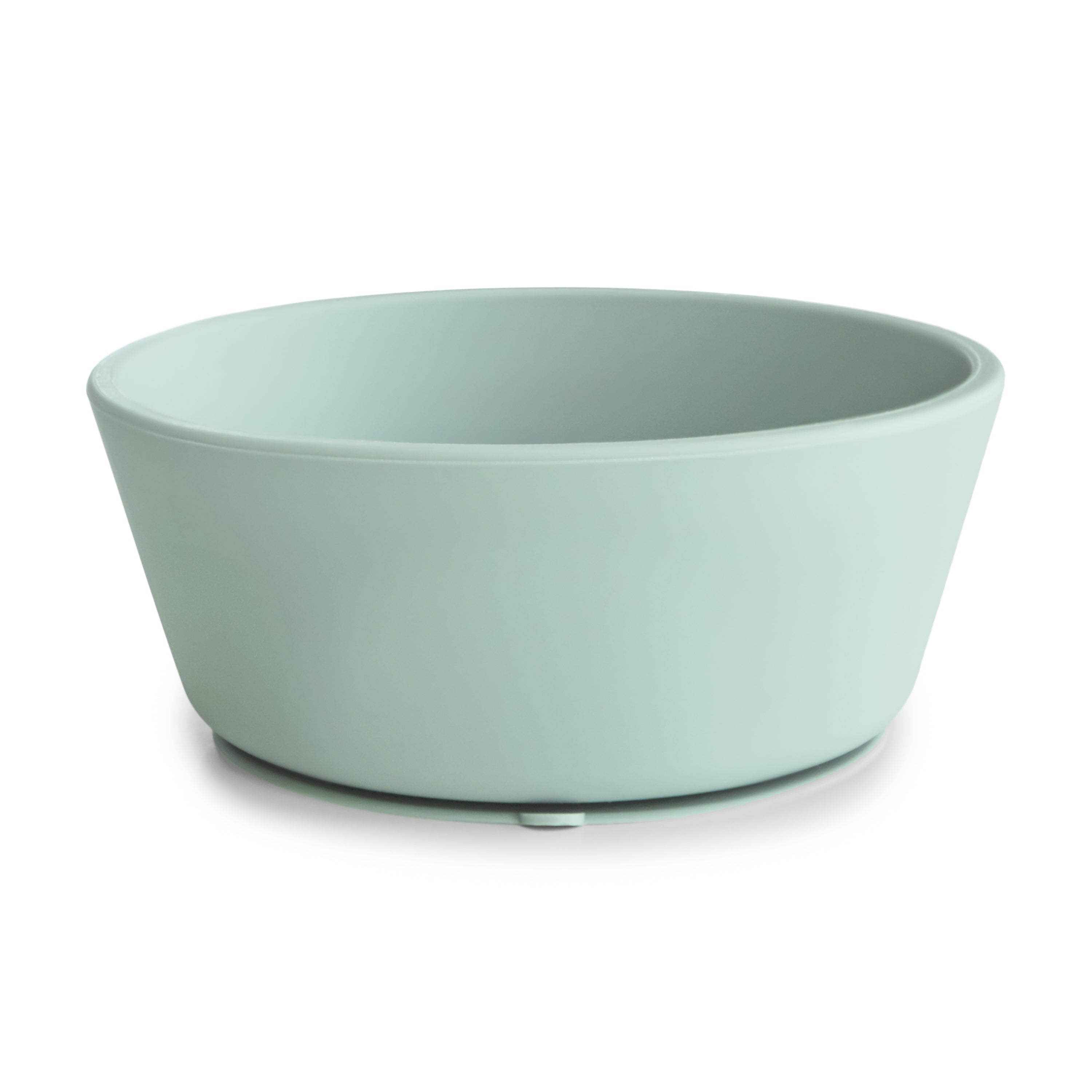 Side view of a Mushie silicone suction bowl in Cambridge blue on a white background