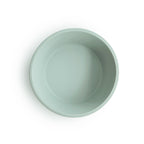 Top view of a Mushie silicone suction bowl in Cambridge blue on a white background