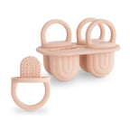 Mushie silicone ice pop tray in Blush on a white background
