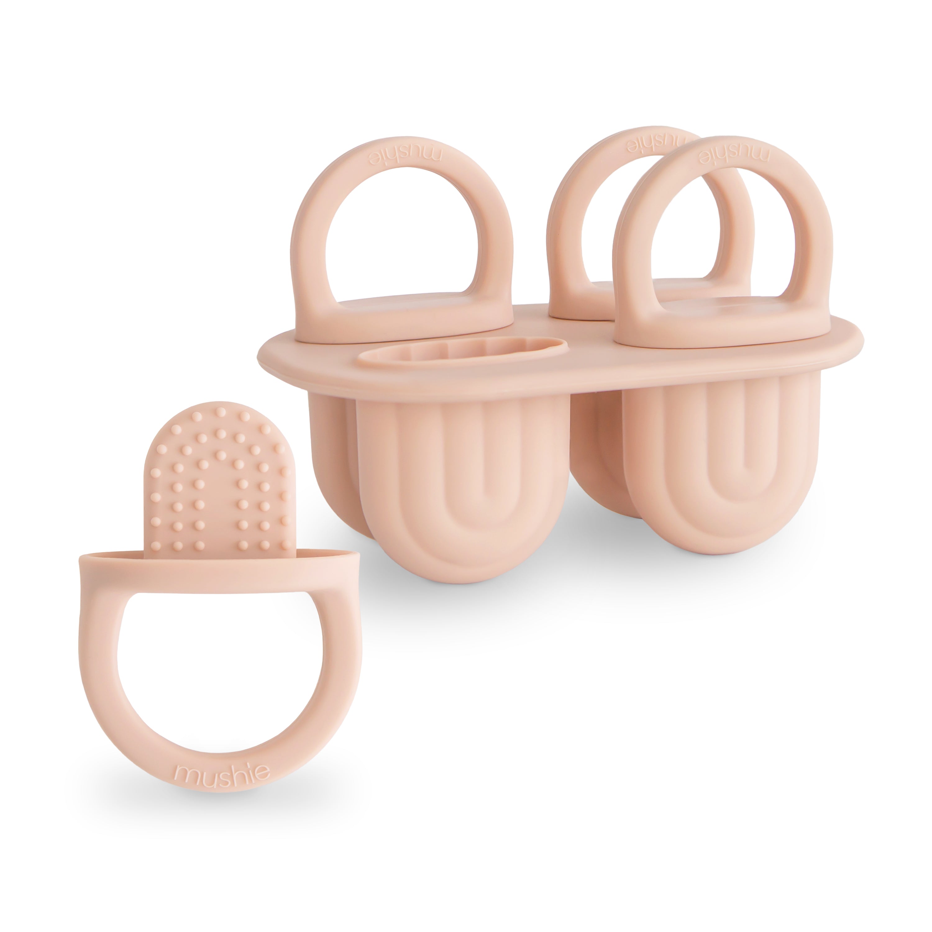 Mushie silicone ice pop tray in Blush on a white background