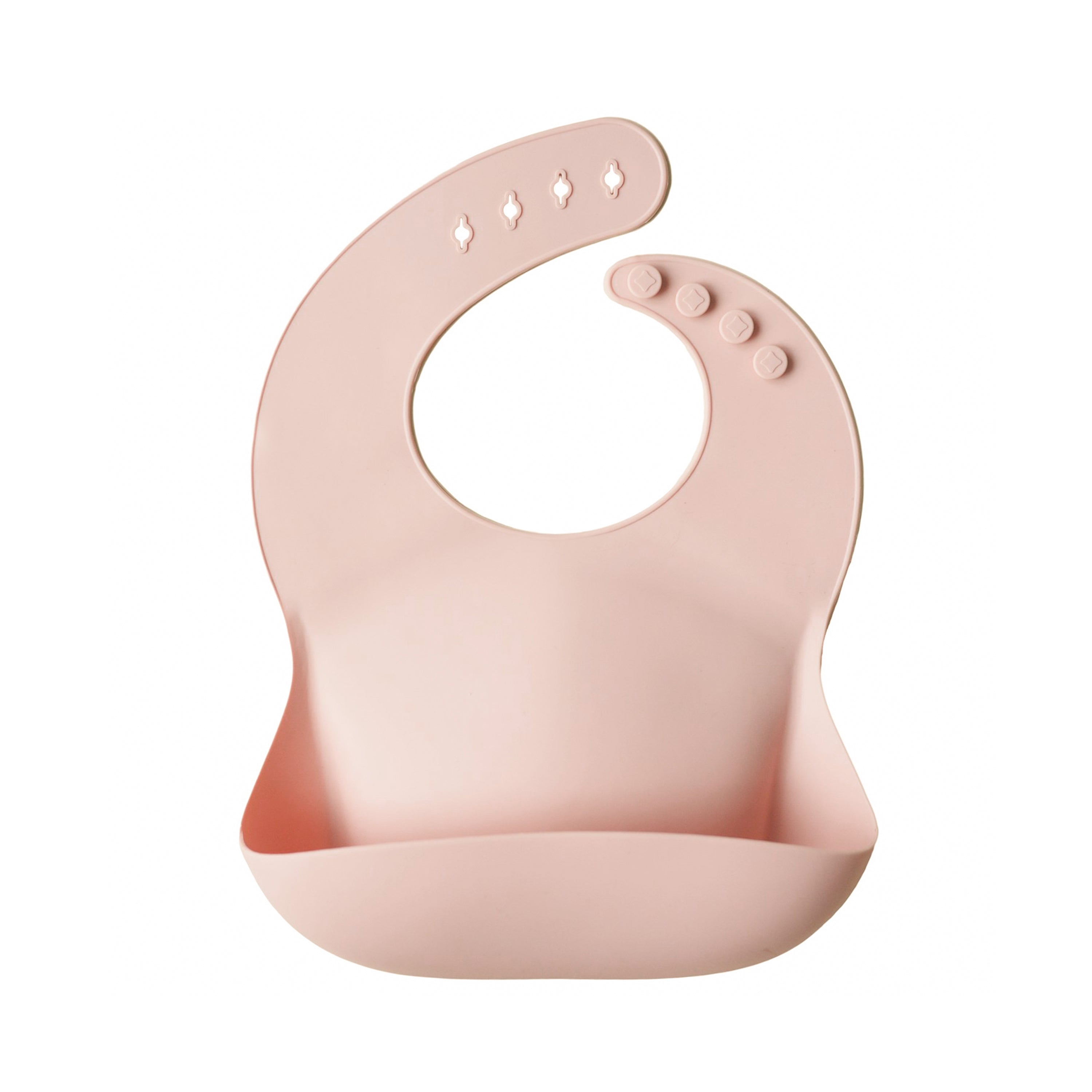 Mushie silicone bib in Blush on a white background