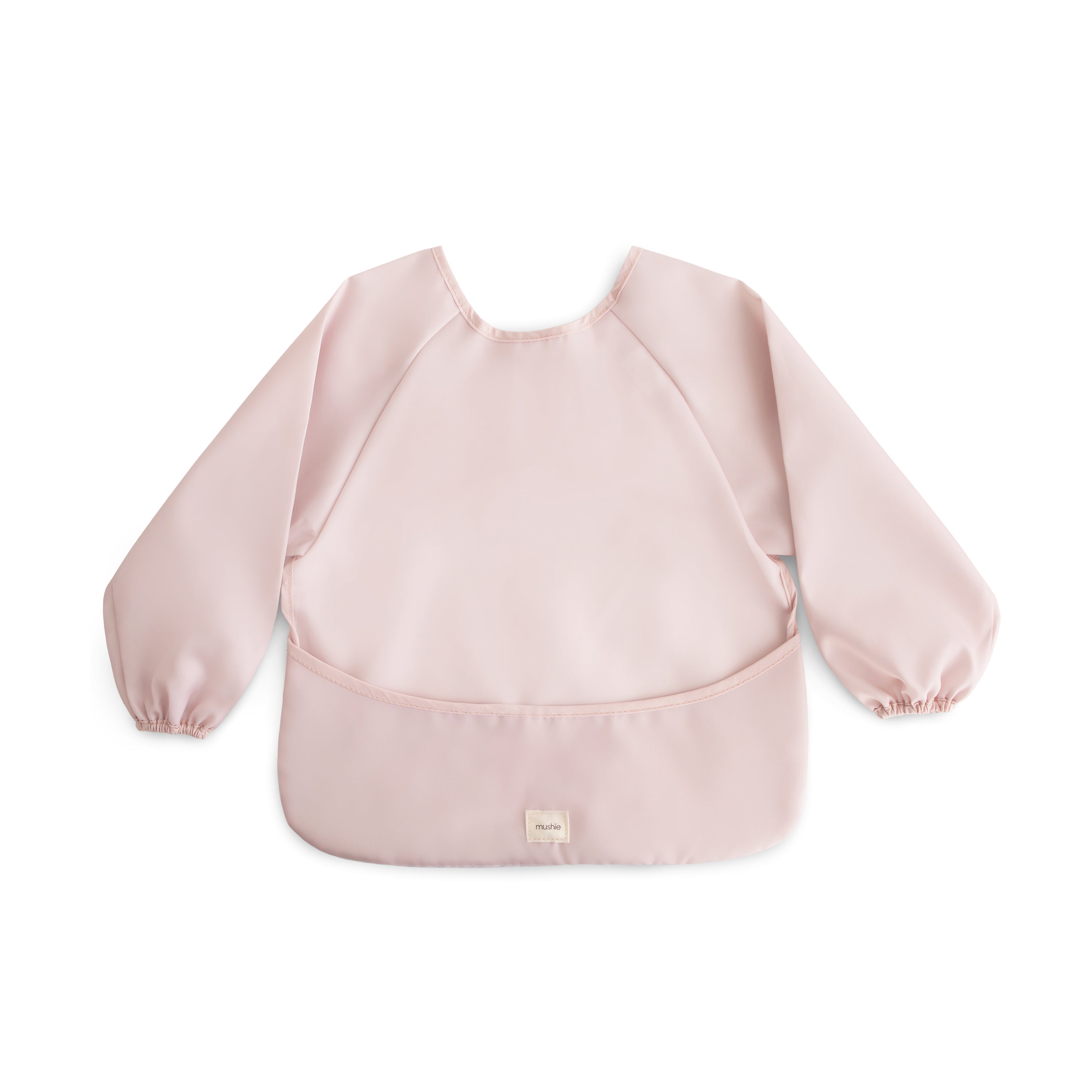 Mushie long sleeve bib in Blush on a white background