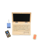 Top view of a Kid's Concept wooden computer play set on a white background