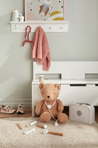 Children's room with a teddy bear, Kid's Concept doctor’s case play set in white on a light background, and white desk