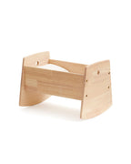 Kids Concept doll crib on a white background