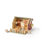 Kid's Concept wooden farmhouse toy on a white background