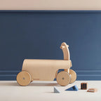 Kid's Concept ride-along kart on a blue background