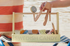 Close-up of two kids playing with a Kids Concept Swedish candy shop play set