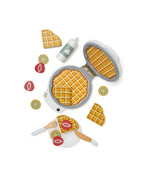 Top view of a Kid's Concept wooden waffle iron toy on a white background