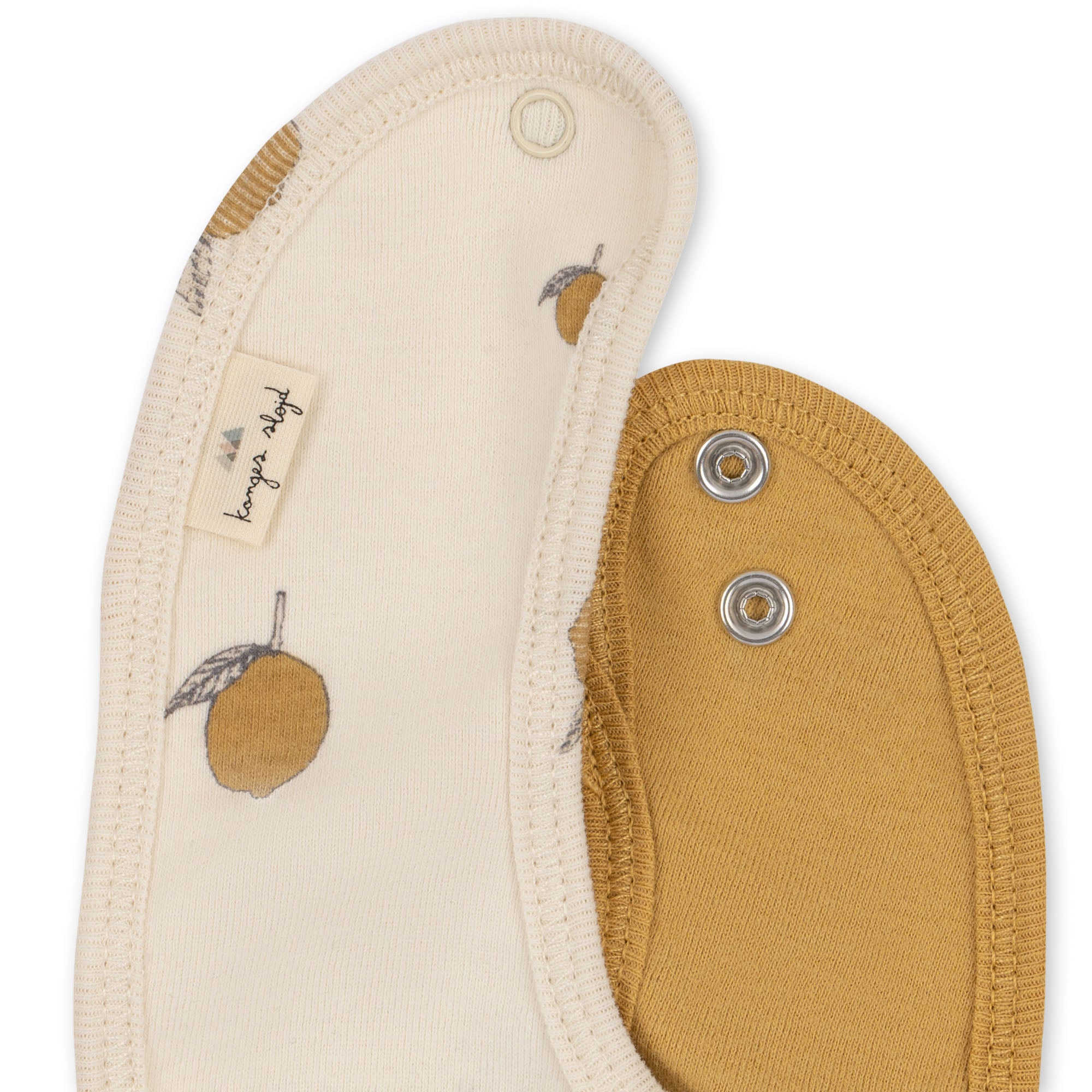 Close-up of Konges Sløjd 2-pack Bibs in Lemon fabric and press studs