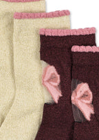 Close-up of the Konges Sløjd 2-pack Bow Socks in Bow mix on a white background.
