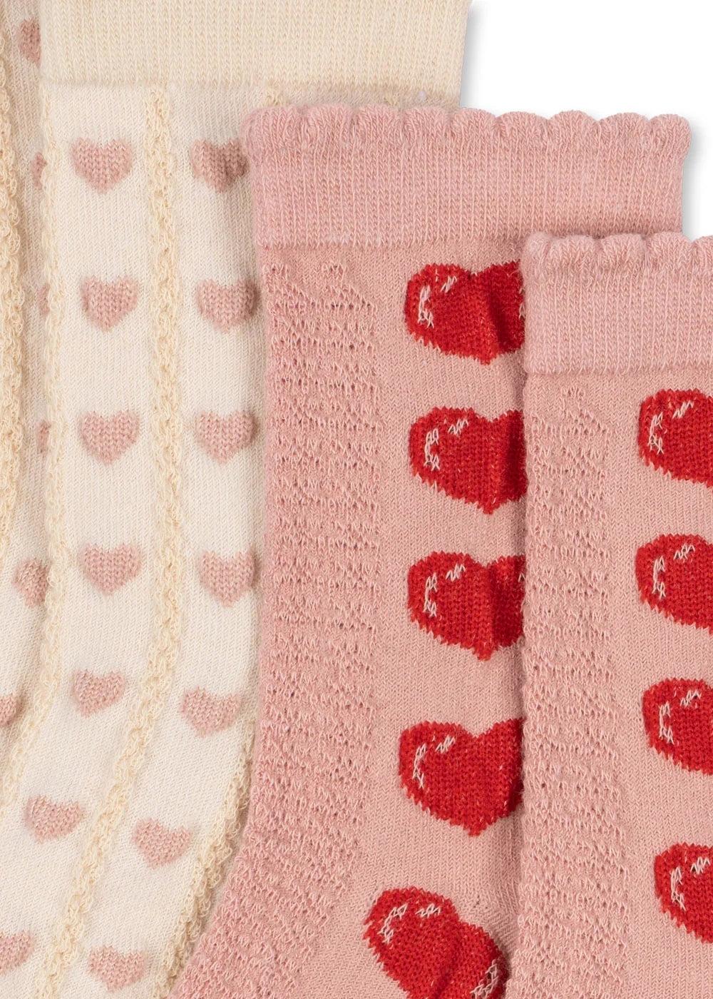 Close-u of the Konges Sløjd Bow 2-pack Heart Jaquard Socks in Heart mix on a white background.