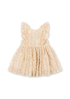 Front view of the Konges Sløjd Ally dress in Sandshell on a white background