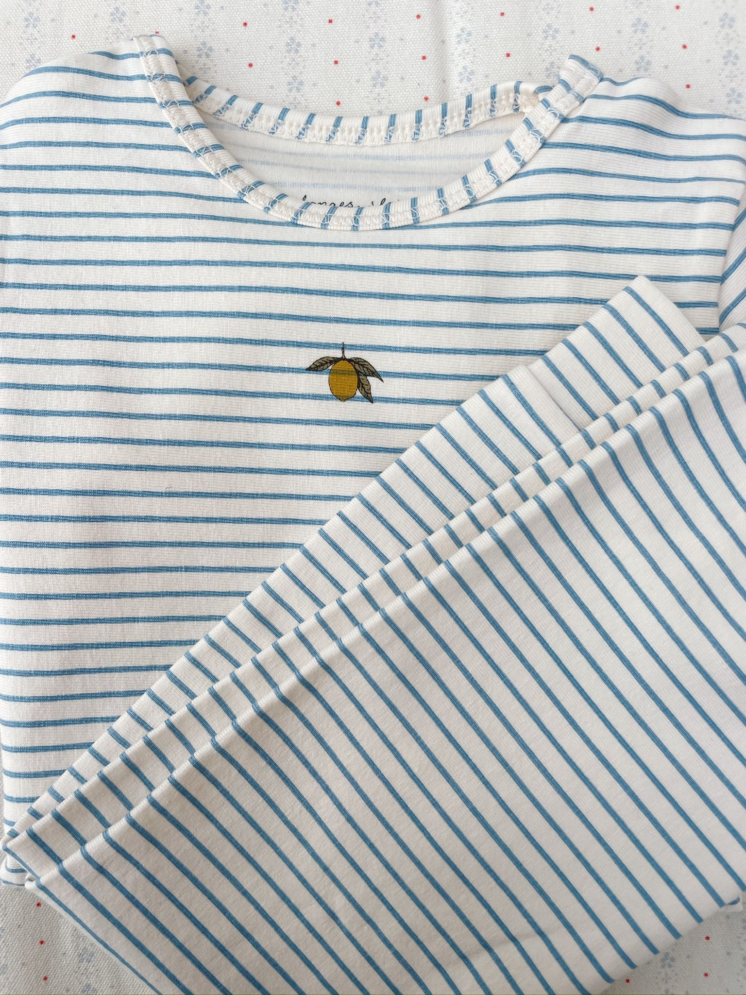 Close-up of Konges Sløjd basic blouse in Stripe Bluie fabric