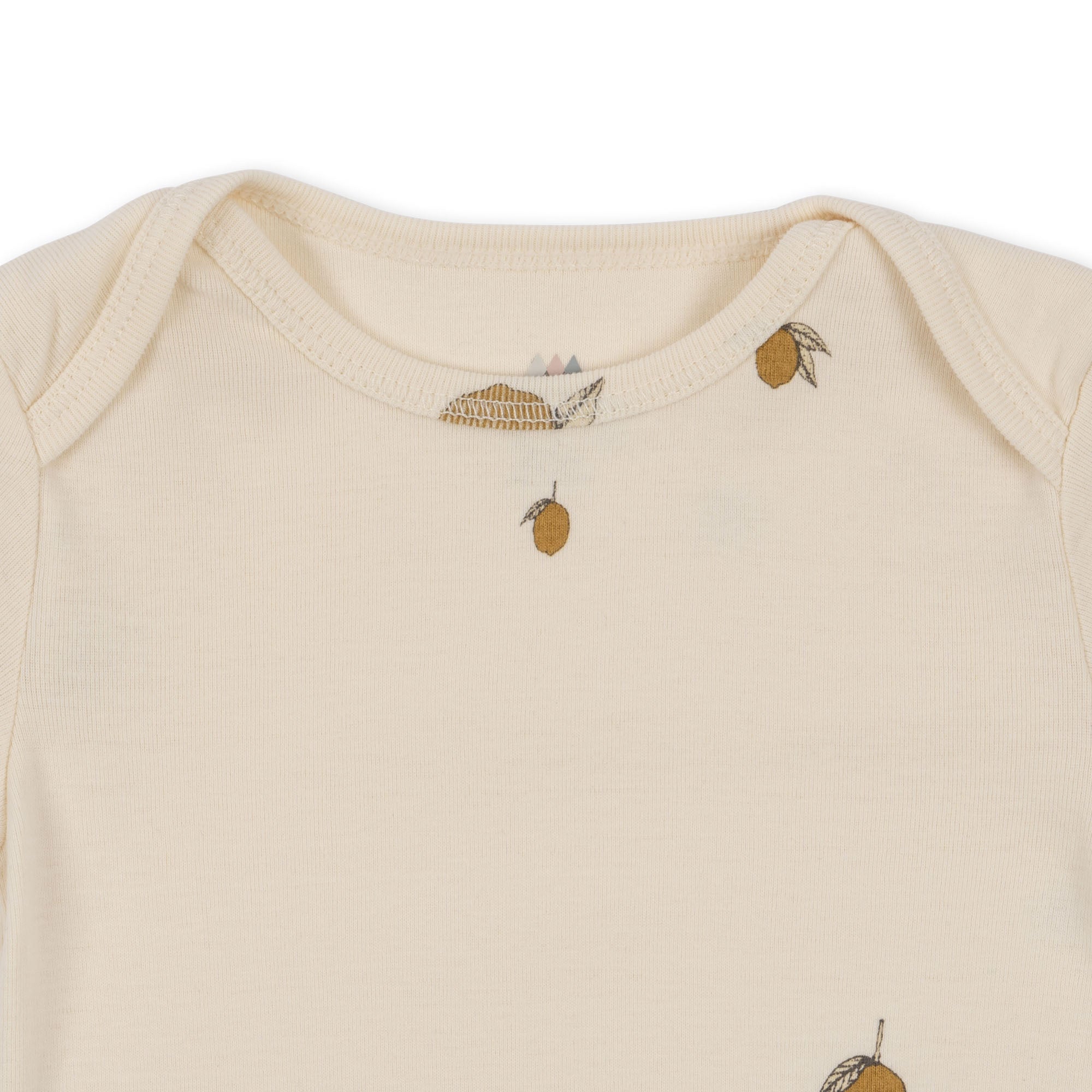 Close-up of Konges Sløjd Body in Lemon fabric and collar