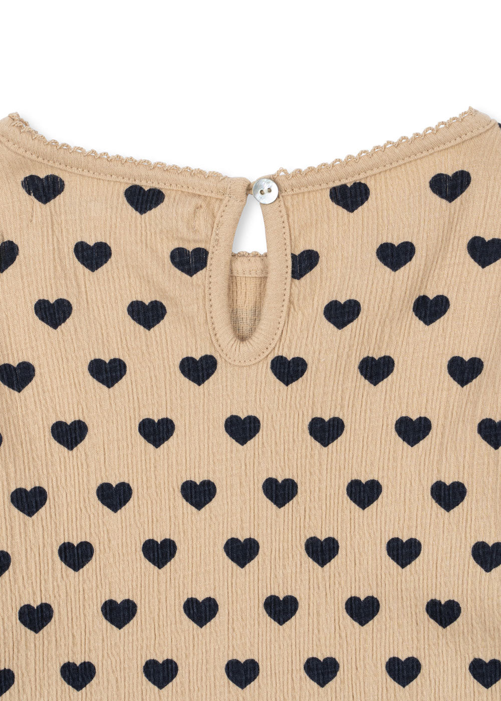 Close-up of Konges Sløjd Chleo dress in Coeur eclipse fabric