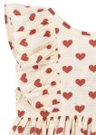 Close-up of a sleeve of the Konges Sløjd Cianna bow dress in Amour rouge
