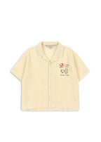 Front view of a Konges Sløjd Coco shirt on a white background