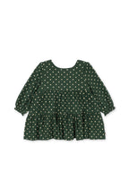 Front view of the Konges Sløjd Elin long-sleeve bow dress in Dot Marseille on a white background.