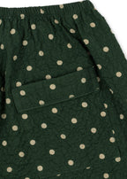 Close-up of the Konges Sløjd Elin Bow pants in Dot Marseille on a white background.