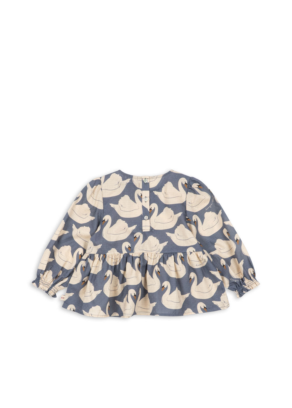 Back view of the Konges Sløjd Evia blouse in Swan print on a white background.